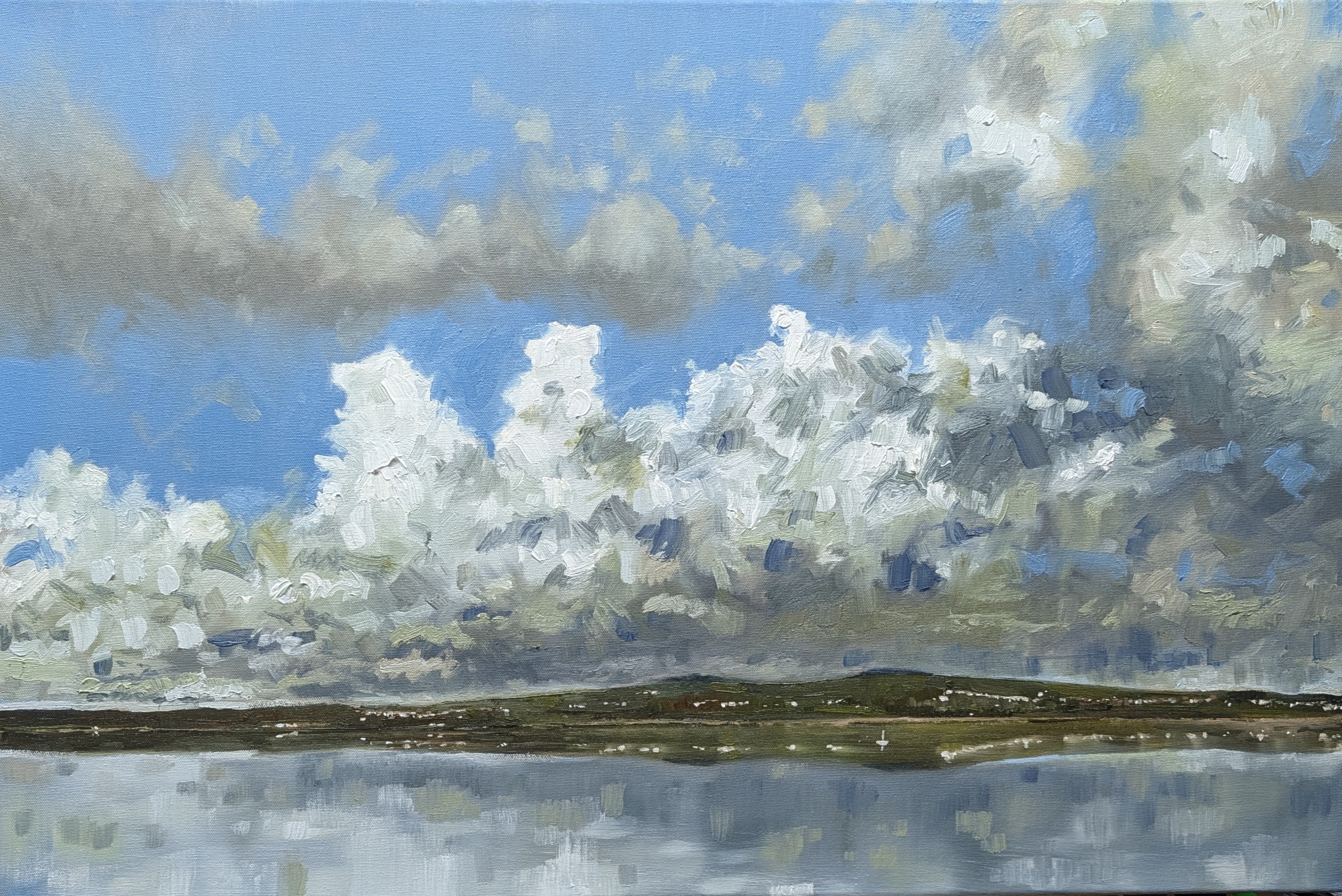 Starcross over to Exmouth — large billowing cumulus clouds over the Exe estuary with reflections in calm water